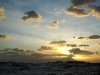 Sunset vista offshore in the Pacific with swell